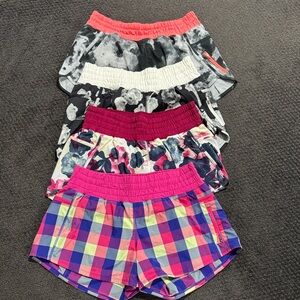 Lululemon Tracker shorts sz 10 lot of 4 euc